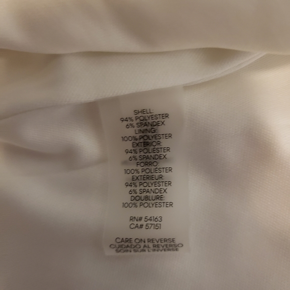 Solid Sleeveless Cascading Ruffle Dress - Picture 7 of 10